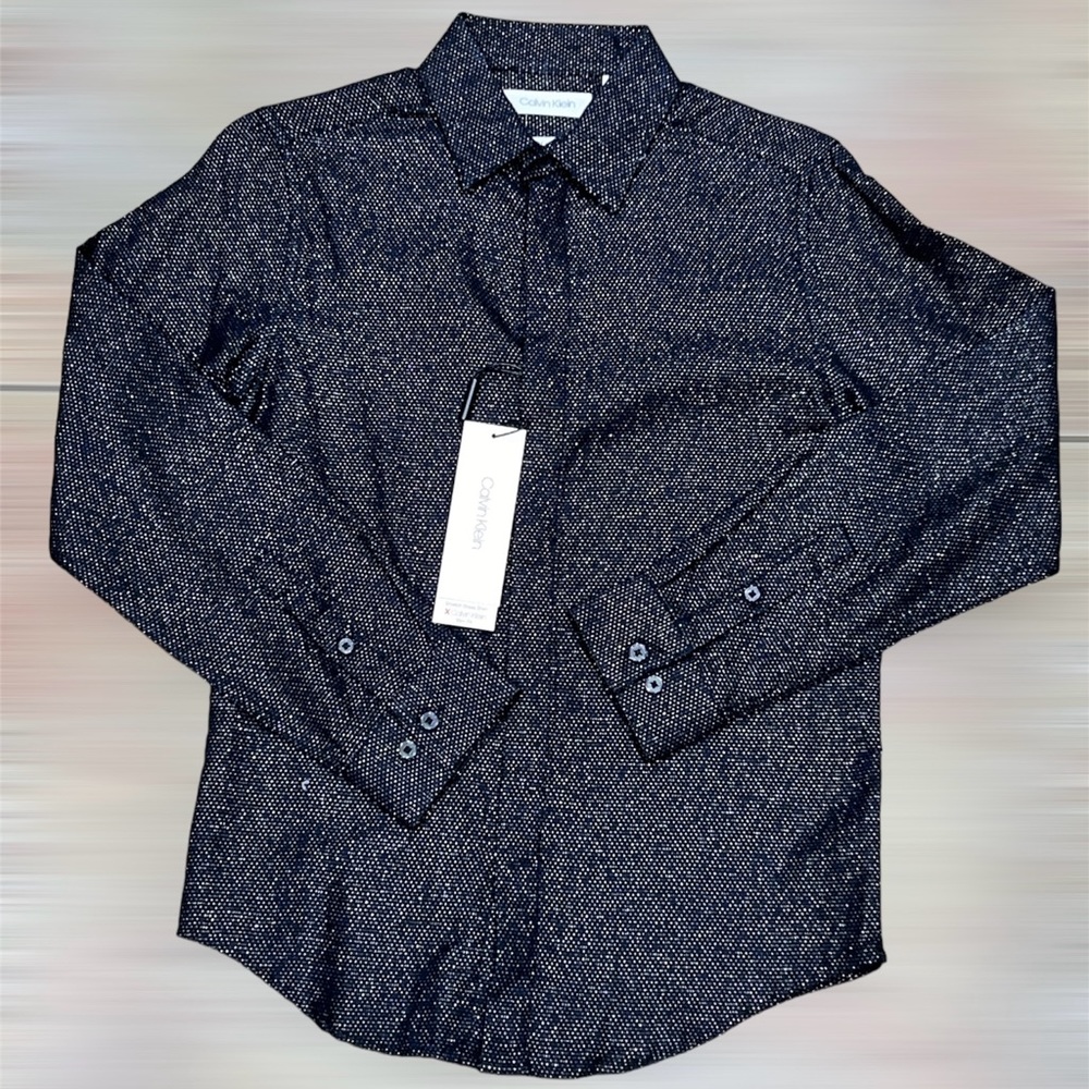 New! Calvin Klein Dress Shirt

Black

Size 10 boys